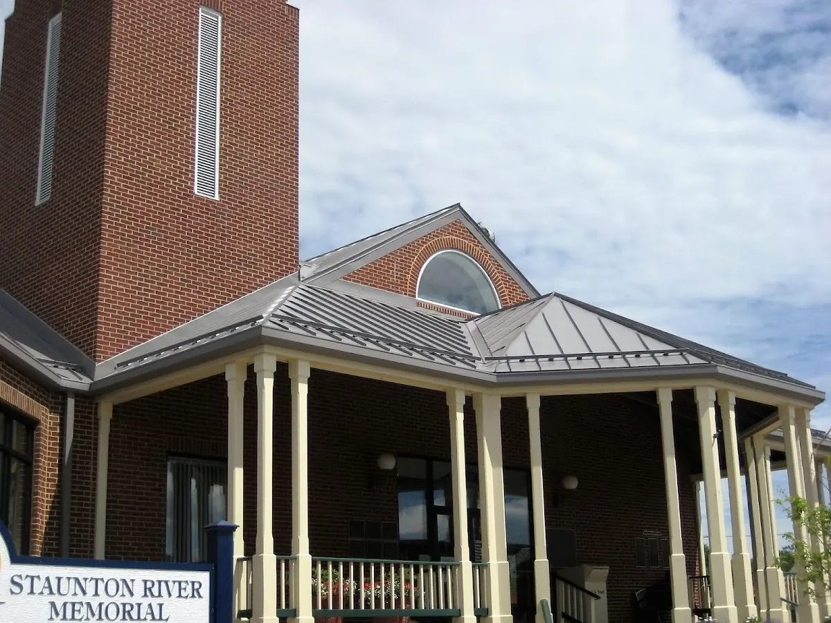 Skilled roofing craftsmen working on a residential roof in Knoxville